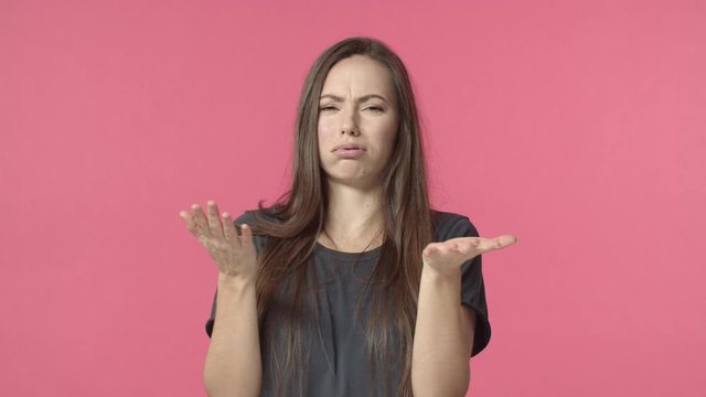 Come on its awful and really bad. Frustrated and disappointed picky, ignorant young woman, grimacing from disgust and disappointment, raise hands in dismay, make stop and rejecting bothering offer