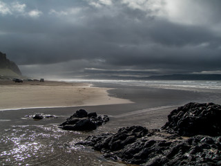 Sun and clouds on a quiet beach in Northern Ireland
