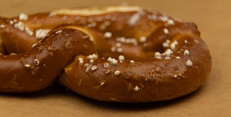 Freshly baked salty pretzel - fresh from the oven - food photography
