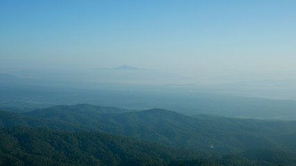 Landscape view mountain high on blue sky at north THAILAND.Holiday travel wildlife.Panorama scene nature forest morning view high angle.Winter season wonderful.Plant scenery fog beautiful outdoor hill