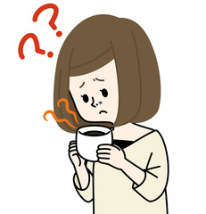 飲み物の匂いを嗅ぐ女性