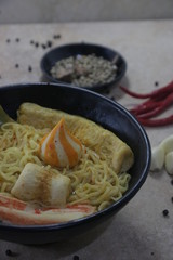 ramen with a variety of vegetables and seafood.