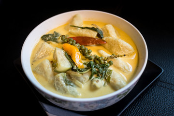 Green curry is a Thai food with fish ball ingredients.