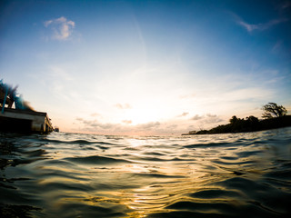 Fish Eye lens in the ocean during a sunset