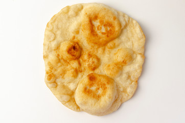 Navajo fried bread isolated on white background