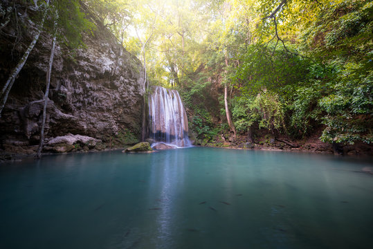 Erawan waterfall, beautiful waterfall in forest and sunshine in morning. Kanchanaburi, Thailand. Nature background