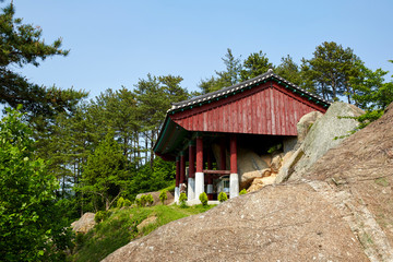 Seated Rock-carved Buddha of Yusin-ri in Boseong-gun, South Korea.
