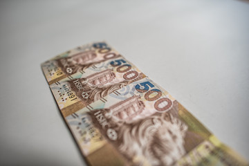 hong kong dollar notes on white background.