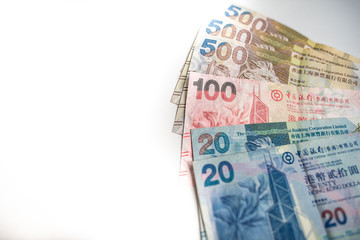 hong kong dollar notes on white background.