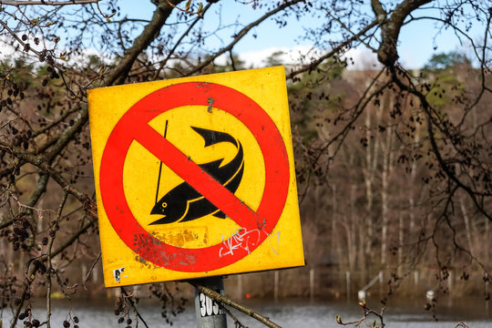 Stockholm, Sweden  A no-fishing sign on the Lotsjon lake in the Sundbyberg suburb.