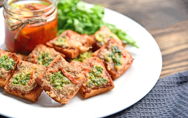 Fried toasts with Minced Pork Spread with chili sauce (Thai Pork Toast) . Toasts Menu for children.