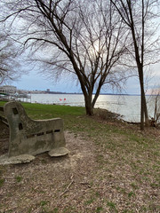 hazy sun views from the lake pier bench lake locks