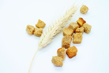 Salted rye crackers and rye earare are located on a white background