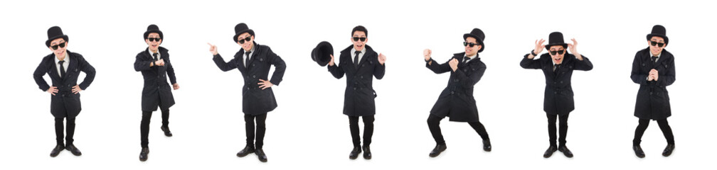 Young detective in black coat isolated on white