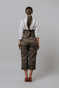 Businesswoman full body facing back