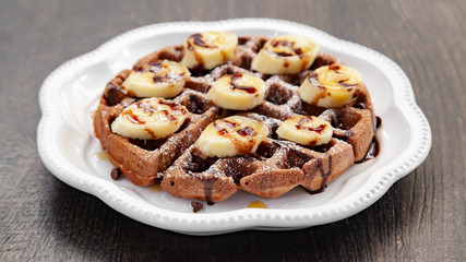 Chocolate banana waffle with caramel sauce
