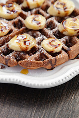 Chocolate banana waffle with caramel sauce
