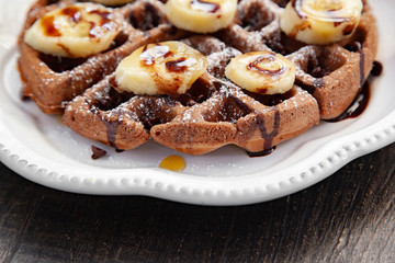 Chocolate banana waffle with caramel sauce