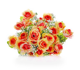 Artificial rose flower isolated on a white background.