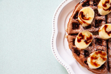 Chocolate banana waffle with caramel sauce