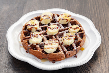 Chocolate banana waffle with caramel sauce