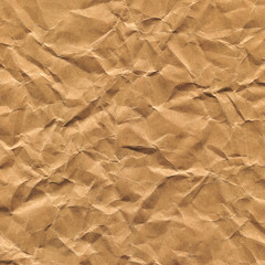 Fototapeta na wymiar Blank crumpled brown paper textured background