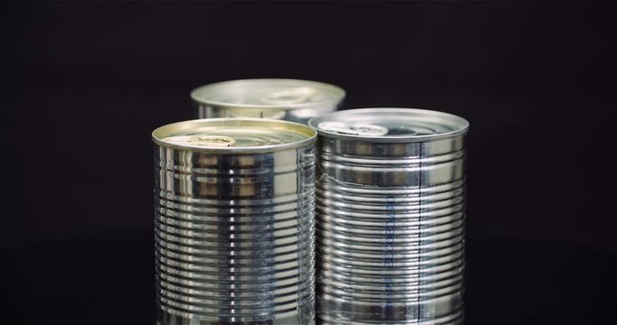 Food supplies Canned Food Rotating on Black Background