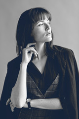 Model in a plaid jumpsuit