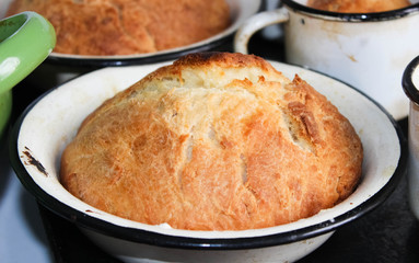 Baked cake not yet decorated in a plate for Easter.