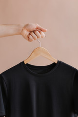 Black sweater on a hanger
