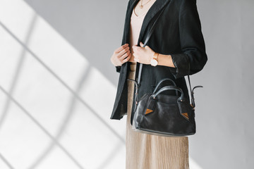 Naklejka premium Black leather purse product shoot