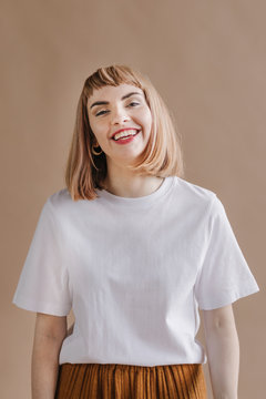 Blonde model posing in a studio