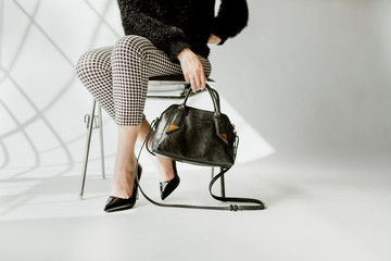 Black leather purse product shoot