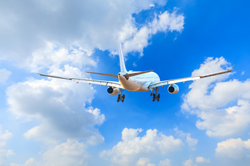 Commercial airplane flying in the sky,travel concept.