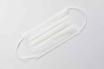 Medical mask on gray background