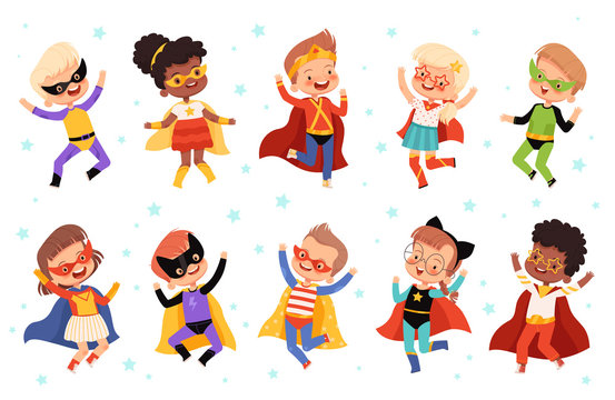 Set with cute kids superheroes. Joyful guys in superhero costumes jump and laugh