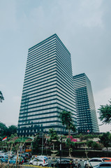 Obraz premium Jakarta, Indonesia - November 02, 2019: The business district of Jakarta along Jalan Sudirman. Jakarta is Indonesia capital city. 