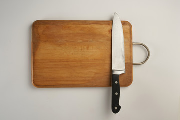 chopping board with kitchen knife