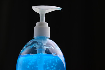 clean alcohol gel medical on black background