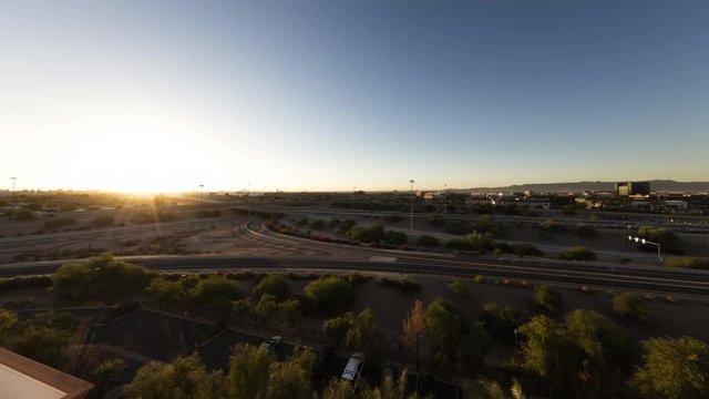 Timelapse of a highway as the sun rises over Phoenix.