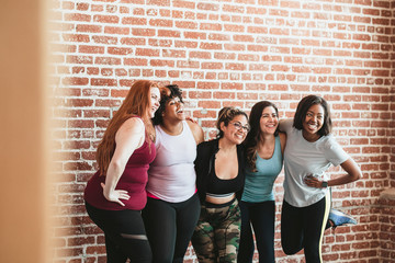 Happy women in a fitness studio