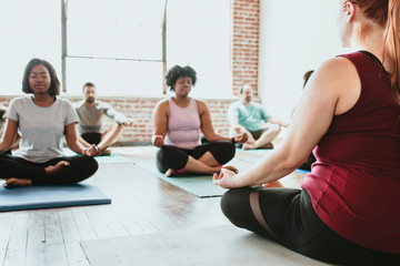 Yoga class doing meditation