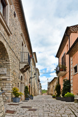A small road between the old houses of Buonalbergo, a village in the province of Benevento