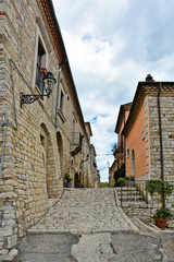 A small road between the old houses of Buonalbergo, a village in the province of Benevento