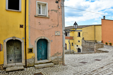 A small road between the old houses of Buonalbergo, a village in the province of Benevento