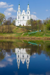 Hagia Sophia with a reflection in the Western Dvina on a Sunny April day. Polotsk, Belarus