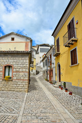 A small road between the old houses of Buonalbergo, a village in the province of Benevento