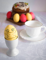 easter table with masked egg