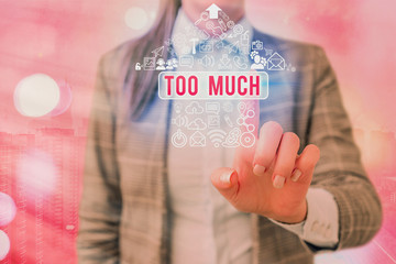 Writing note showing Too Much. Business concept for an intolerable impossible or exhausting...