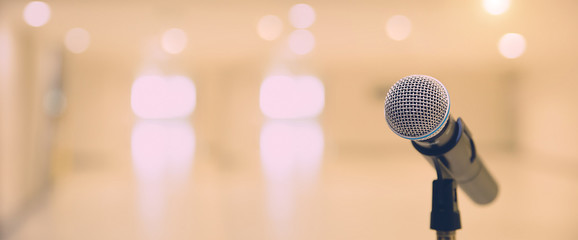 Microphone on the stand for public speaking,Welcoming or Congratulations Speech for Work Success background concept.